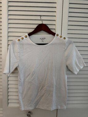Gold-button accented white t-shirt